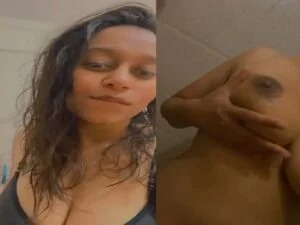Topless girlfriend showing big boobs and playing